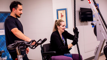 woman and trainer working out